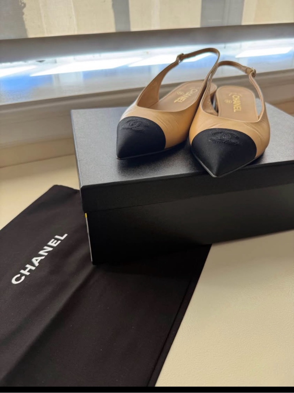 CHANEL Beige and Black Pointed Leather Slingback Flats